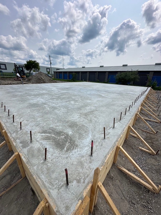 Finished poured concrete slab with rebar dowels